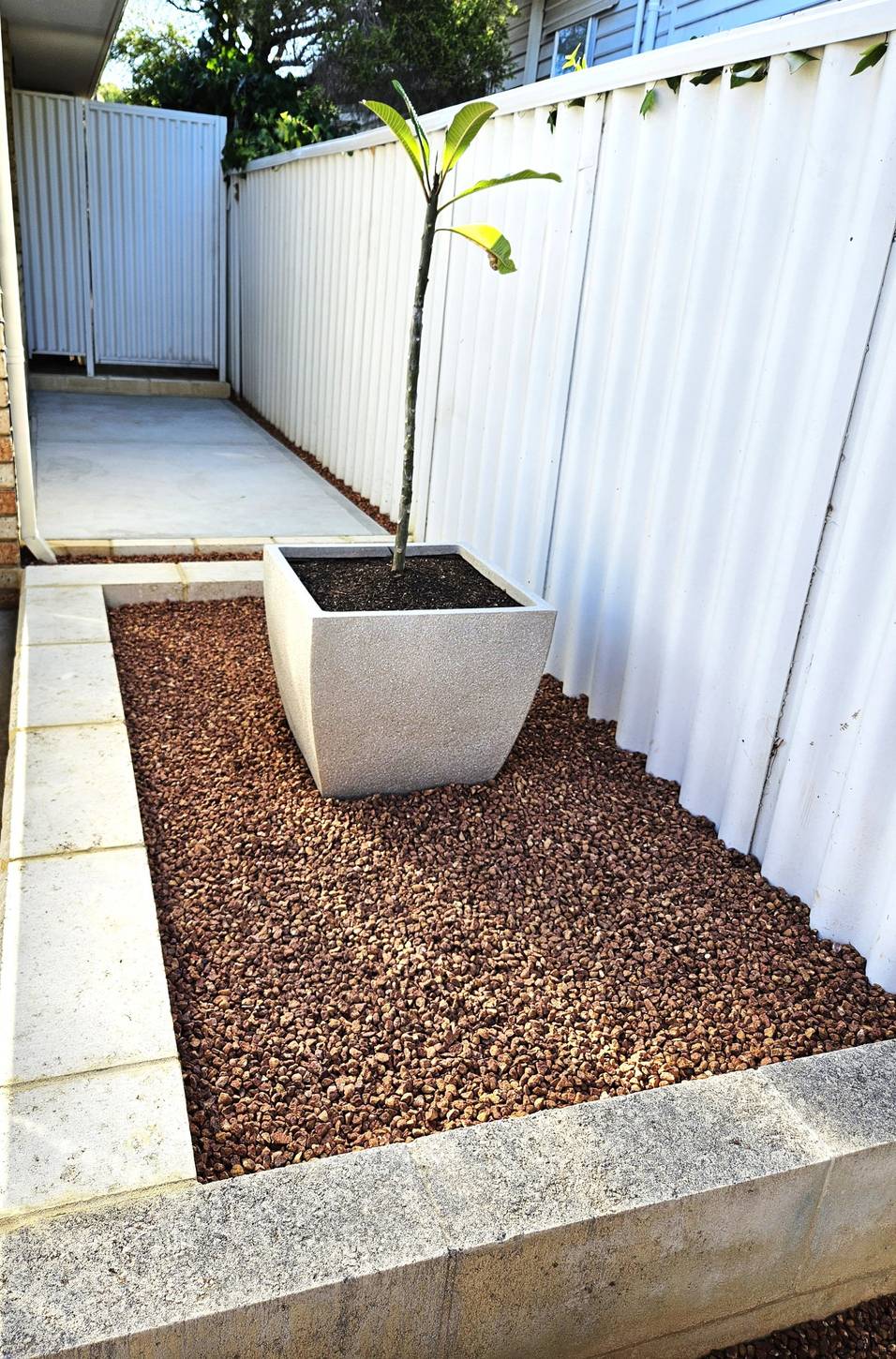 Gravel bed feature planter